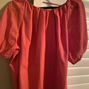 Never worn super cute tangerine  orange blouse with eyelet sleeves!
